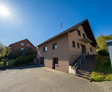 Vermietetes Zweifamilienhaus mit Sauna, Partykeller und Waldblick!