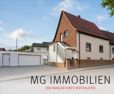 MG – Solides Einfamilienhaus mit Doppelgarage, Garten & Potenzial in zentraler Lage von Spesbach