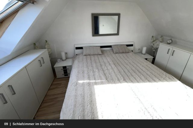 09_Schlafzimmer_im_Dachgeschoss