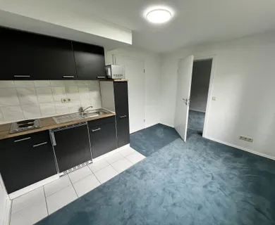 Kompakte 2-Zimmer-Wohnung mit eigener Gartenfläche in Königswinter-Heisterbacherrott - Photo 1