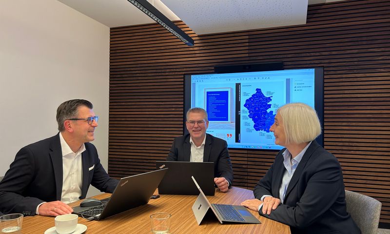 Geschäftsführer der Volksbank Immobilien Münsterland in einer Besprechung