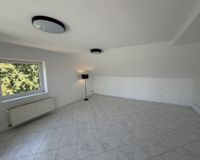 Wohnzimmer gefliest 