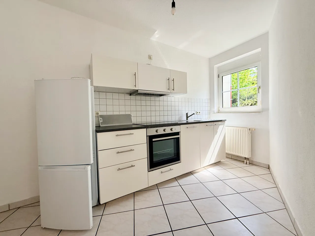 Moderne 1 ZKB/Terrassen Wohnung mit Einbauküche im Souterrain - Foto 2