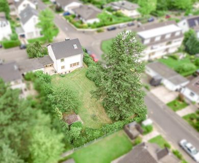Einfamilienhaus mit Garten und angrenzendem Baugrundstück in Bonn-Niederholtorf