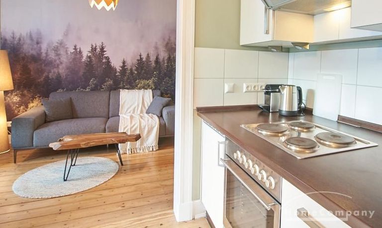 Wohnzimmer mit offener K&uuml;che