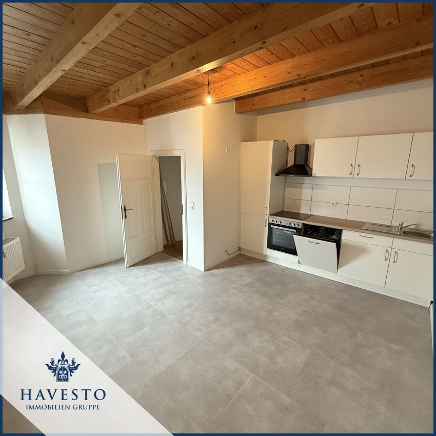 Hochwertig renovierte Dachgeschosswohnung – hell, modern und mit besonderem Wohncharakter! - Foto 1