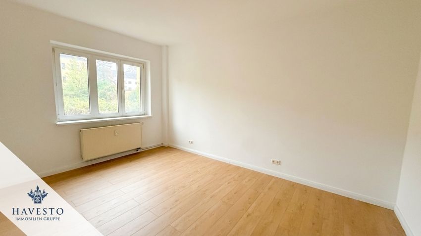 Frisch renovierte 2-Zimmer-Wohnung mit Balkon und Duschbad in grüner Siedlungslage - Foto 1