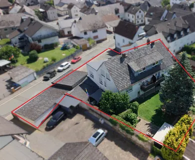 Vollvermietetes 6 Parteienhaus mit zusätzlicher Gewerbeeinheit und Stellplätzen bei Weilburg!