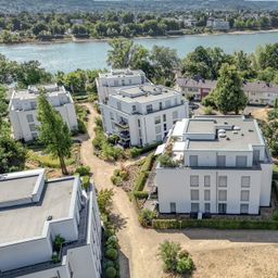 Moderne 3-Zimmer-Wohnung mit eigenem Garten direkt am Rhein!
