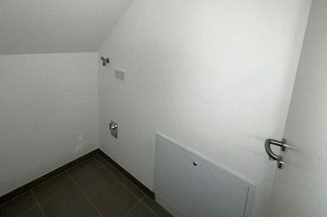Abstellraum mit Anschluss für die Waschmaschine