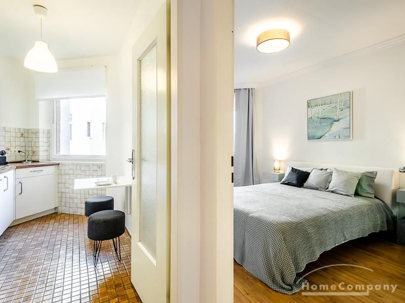 K&uuml;che und Schlafzimmer