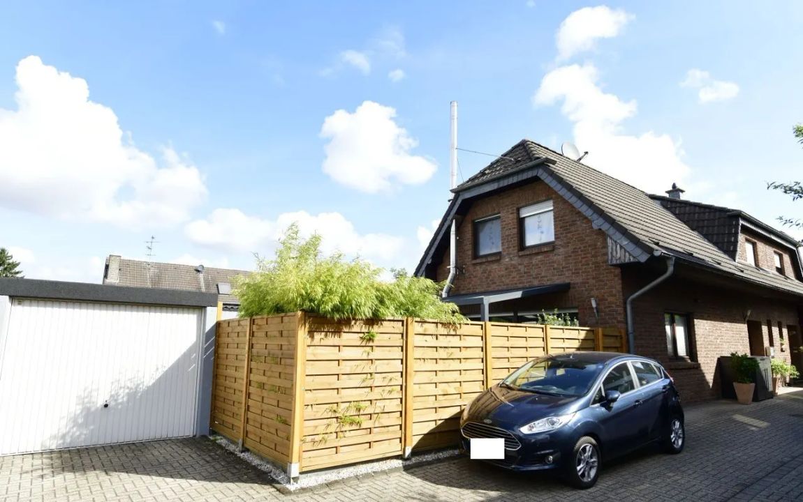Einziehen und Wohlfühlen! Junge Walmdach-DHH mit Garage in Duisburg Rumeln-Kaldenhausen