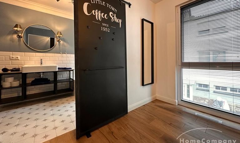 Schlafzimmer mit  Badezimmer