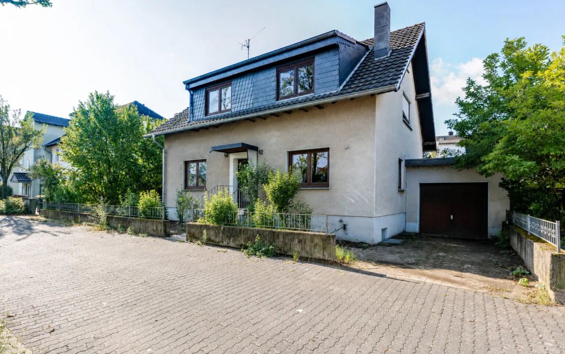 Sanierungsbedürftiges Einfamilienhaus mit viel Potenzial in toller Lage