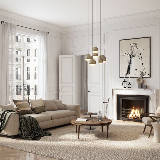 Eleganter, luxuriöser Wohnraum mit offenem Kamin