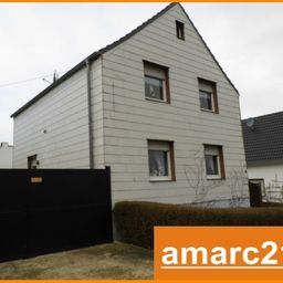 Wohnhaus mit 2 großen Lagerhallen in Birgel.