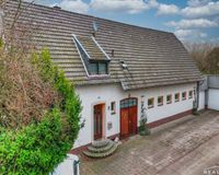 Wohnhaus und Gewerbefläche