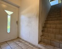 Eingang und Treppe zur Dachgeschosswohnung 