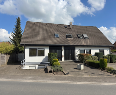 Einfamilienhaus mit vermieteter Einliegerwohnung und großem Keller in Altenbönen