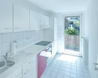 Küche mit Balkonzugang