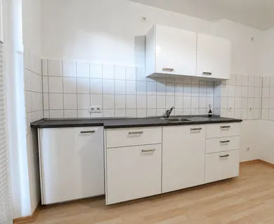 Schöne ca. 56m² große 2-Zimmer-Wohnung mit Balkon in gepflegtem Mehrfamilienhaus - Foto 2
