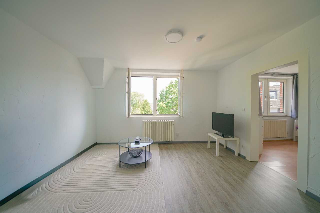 Ratingen-Ost: Helle 2-Zimmer-Wohnung mit Einbauküche und Gartenmitbenutzung - Photo 1