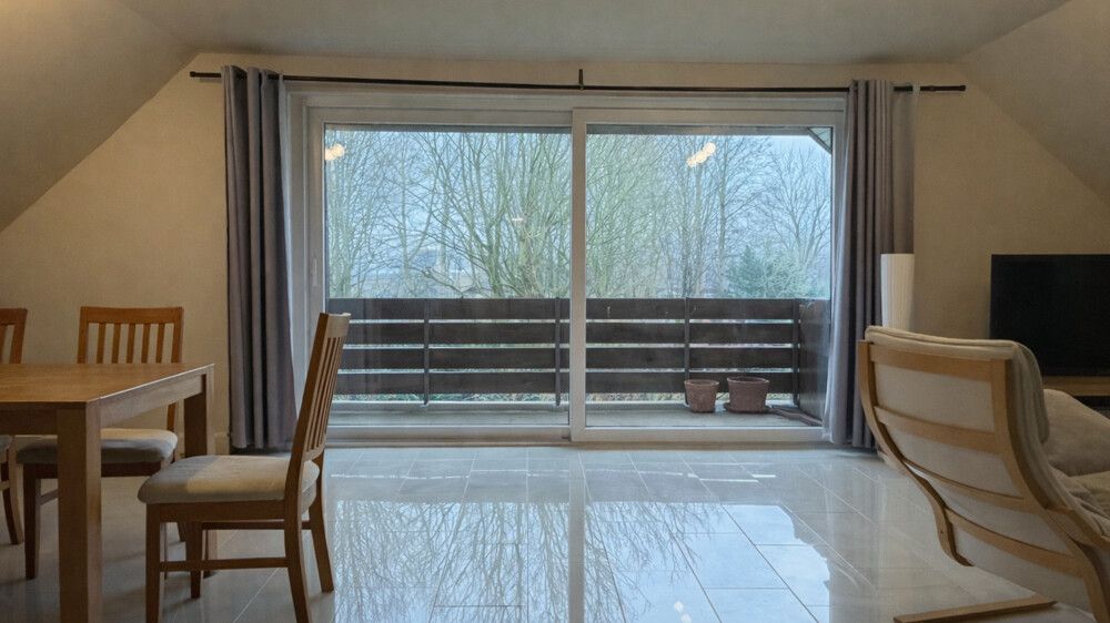 Das Wohnzimmer mit Loggia