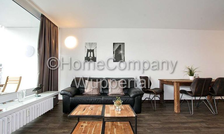 Neues Business- Apartment im Industrial-Style mit Süd-Balkon, DSL-Wifi und Reinigungsservice - Photo 2