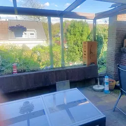 Doppelhaushälfte mit Potenzial, große überdachte Terrasse und Garage direkt am Haus