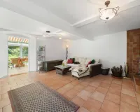 Wohnzimmer mit Kaminofen EG