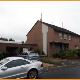 große Eigentumswohnung mit Balkon und Gartenanteil.