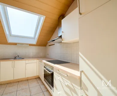 MG – Spacious apartment with tenniscourt view, yard and garage in Bann for rent