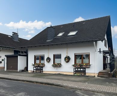 Großzügiges Einfamilienhaus mit Einliegerwohnung in bevorzugter Lage von Siegen-Eiserfeld!