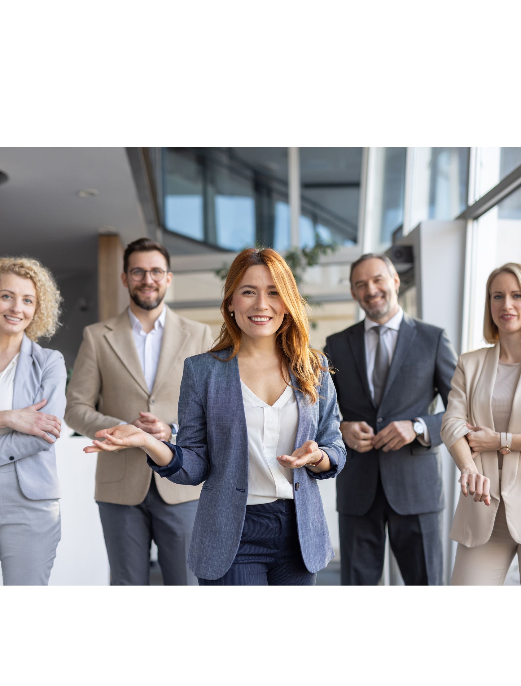 Energetic Businesswoman Leading Team in Office Environment