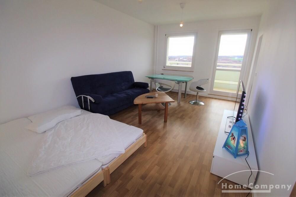 Wohnzimmer mit Schlafcouch + TV