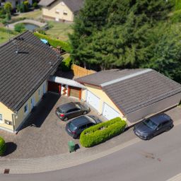Stilvolles Einfamilienhaus mit ausgebautem Dachgeschoss, Garage & großem Garten in attraktiver Lage!