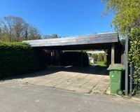 Ein Stellplatz im gemeinsamen Doppelcarport (linke Seite)