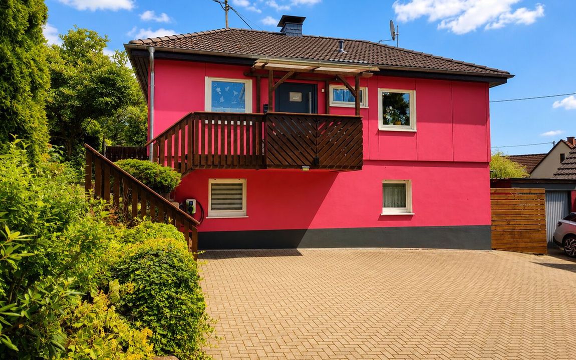Gepflegtes Einfamilienhaus mit Garage und liebevoll angelegtem Garten!
