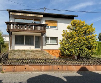 Solides Einfamilienhaus aus 1969 mit Garten und umfangreichen Gestaltungsmöglichkeiten!