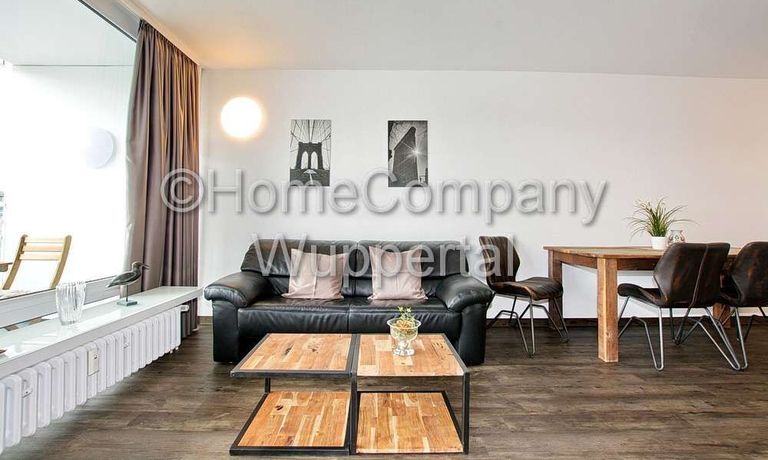 Business- Apartment im Industrial-Style mit Süd-Balkon, DSL-Wifi und Reinigungsservice - Photo 2
