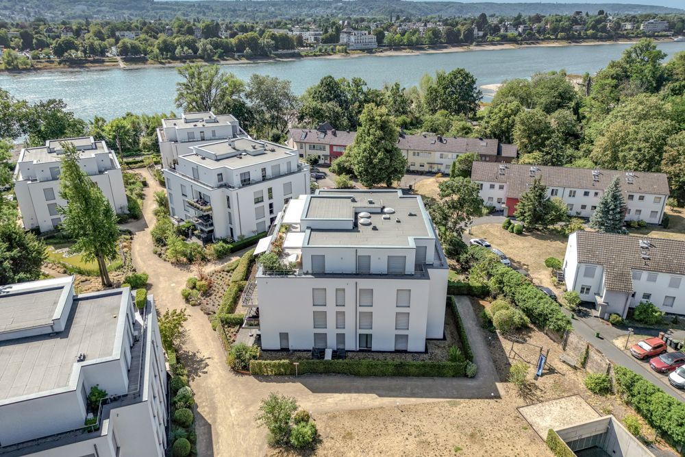 Moderne 3-Zimmer-Wohnung mit eigenem Garten direkt am Rhein!