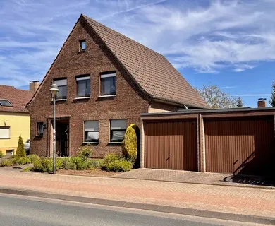 Rheinberg-Budberg: Wohnen wie im Bungalow – aber mit zusätzlicher Mieteinnahme!