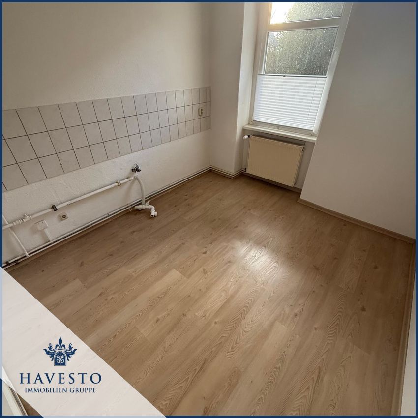 Helle Altbauwohnung mit charmanten Dielenboden und Tageslichtbad – mit moderner EBK Mai 2025! - Foto 1