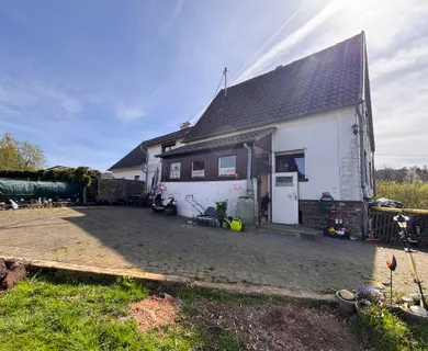 Vermietetes Einfamilienhaus am Ortsrand von Windeck mit Garten und Perspektive zur Wertsteigerung!