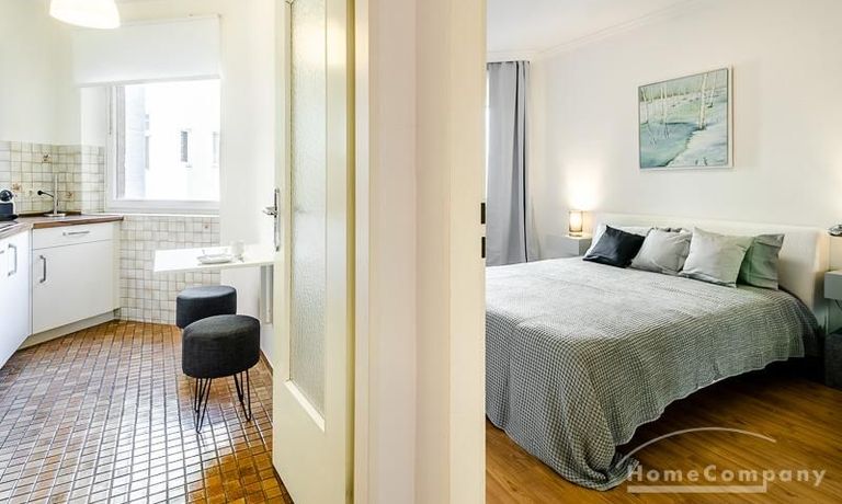 K&uuml;che und Schlafzimmer