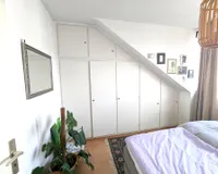 Schlafzimmer mit Einbauschrank