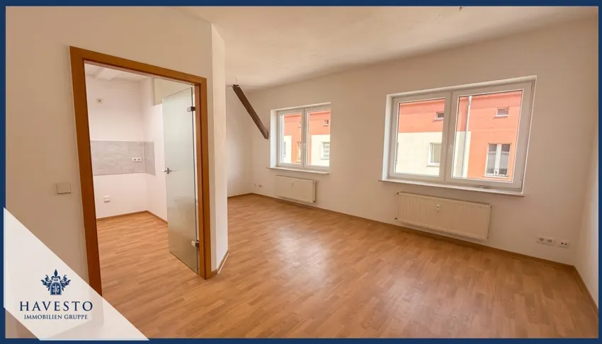 Gepflegte 2-Zimmer-Dachgeschosswohnung mit 61,65 m², separater Küche und Tageslichtbad! - Foto 1