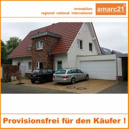 Erdgeschoß mit Garten und Doppelgarage