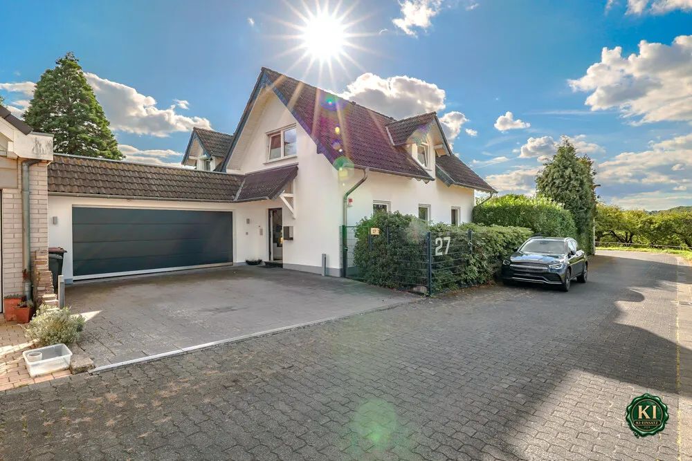 Stilvolles Einfamilienhaus mit großzügigem Grundstück und gehobenem Wohnkomfort