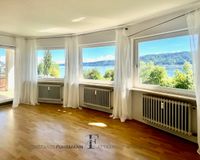 Wohnzimmer mit Seesicht und Zugang zur großen Terrasse